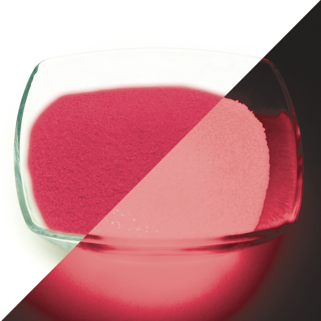 Leuchtgranulat Pink 1 mm, 100 g: Glasschale mit Granulat, links bei Licht pink, rechts im Dunkeln rosa leuchtend