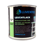 Leuchtlack Grün 250 ml: Dose von vorn mit Etikett „Nachleuchtfarbe: Grün“ bei Tageslicht