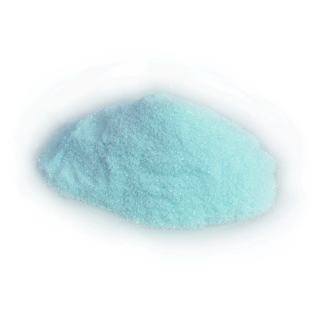 Glitzerpulver Blau-Grün 50 g: Häufchen bei Tageslicht, hellblau mit feinen Glitzerpartikeln